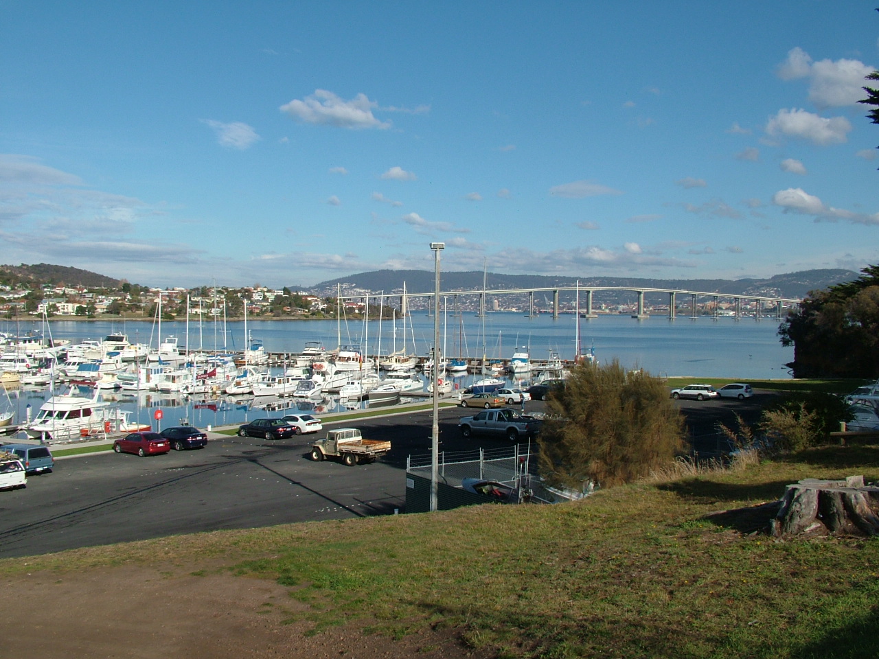 Lindisfarne Bay marina with the Derwent River and Tasman Bridge